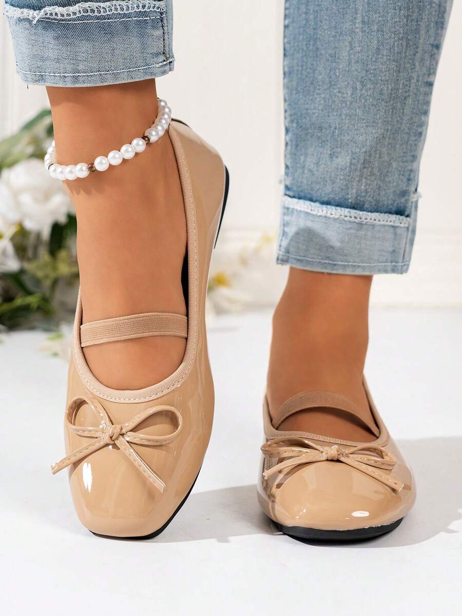 Square toe ballet flat shoes with bow detail and slip-on wide fit design.
