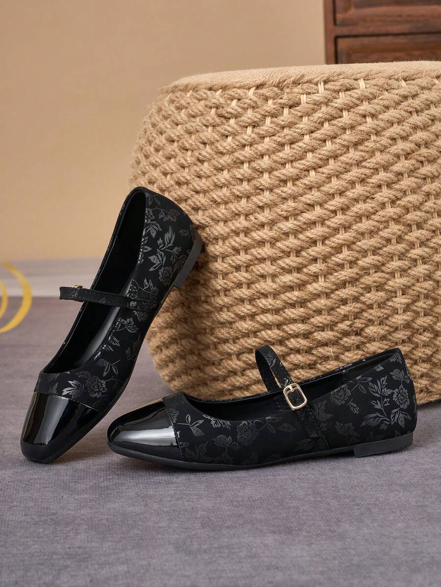 Pair of women's square toe slip-on flat shoes featuring a delicate bow detail and low vamp design.