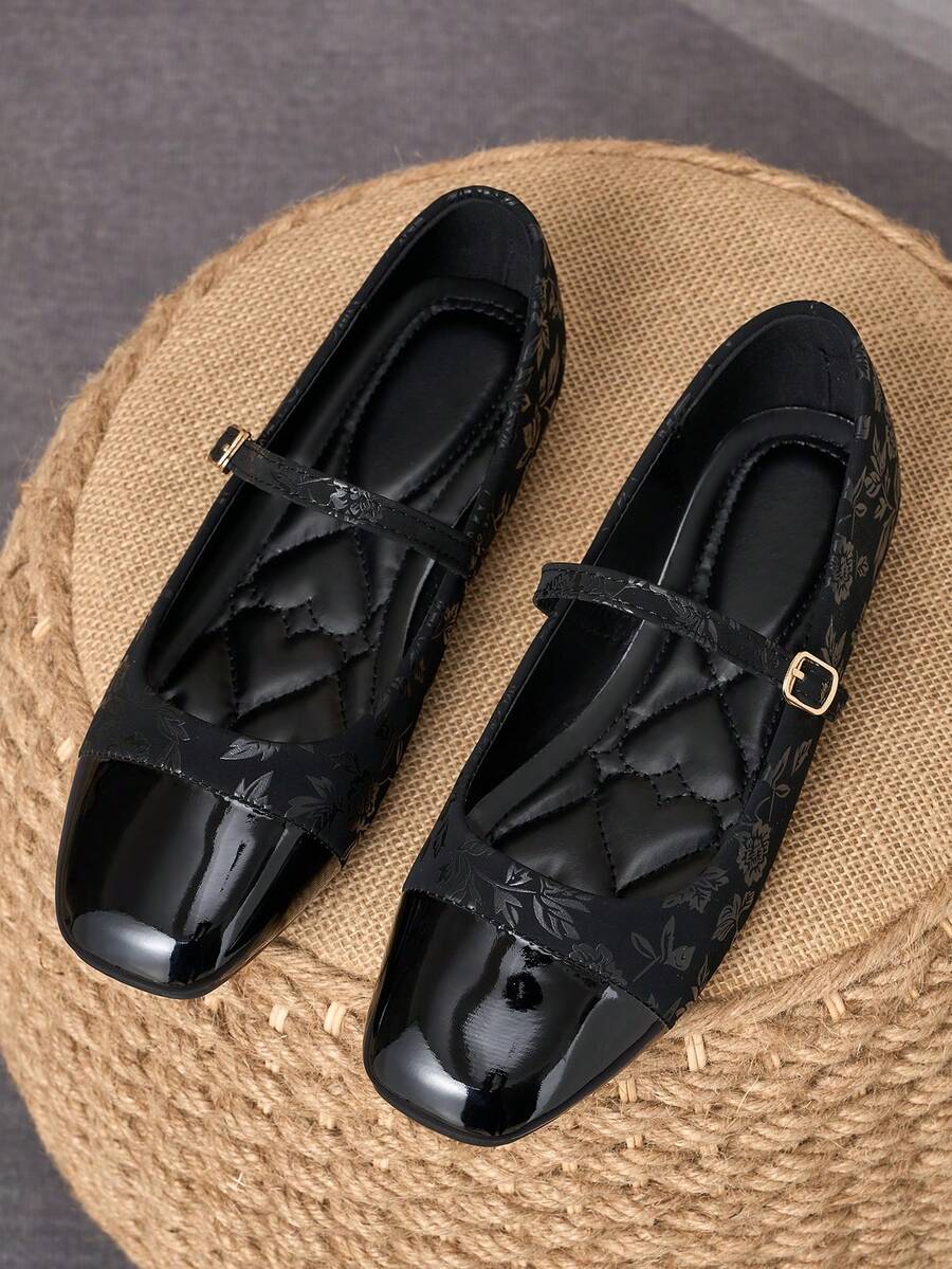 Pair of women's square toe slip-on flat shoes featuring a delicate bow detail and low vamp design.