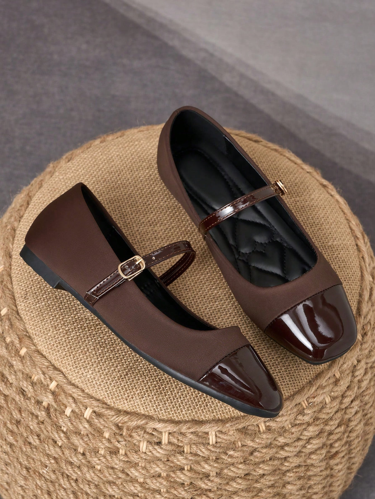Pair of women's square toe slip-on flat shoes featuring a delicate bow detail and low vamp design.