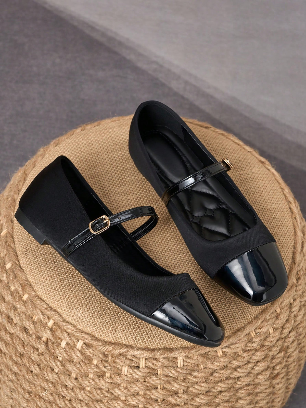 Pair of women's square toe slip-on flat shoes featuring a delicate bow detail and low vamp design.