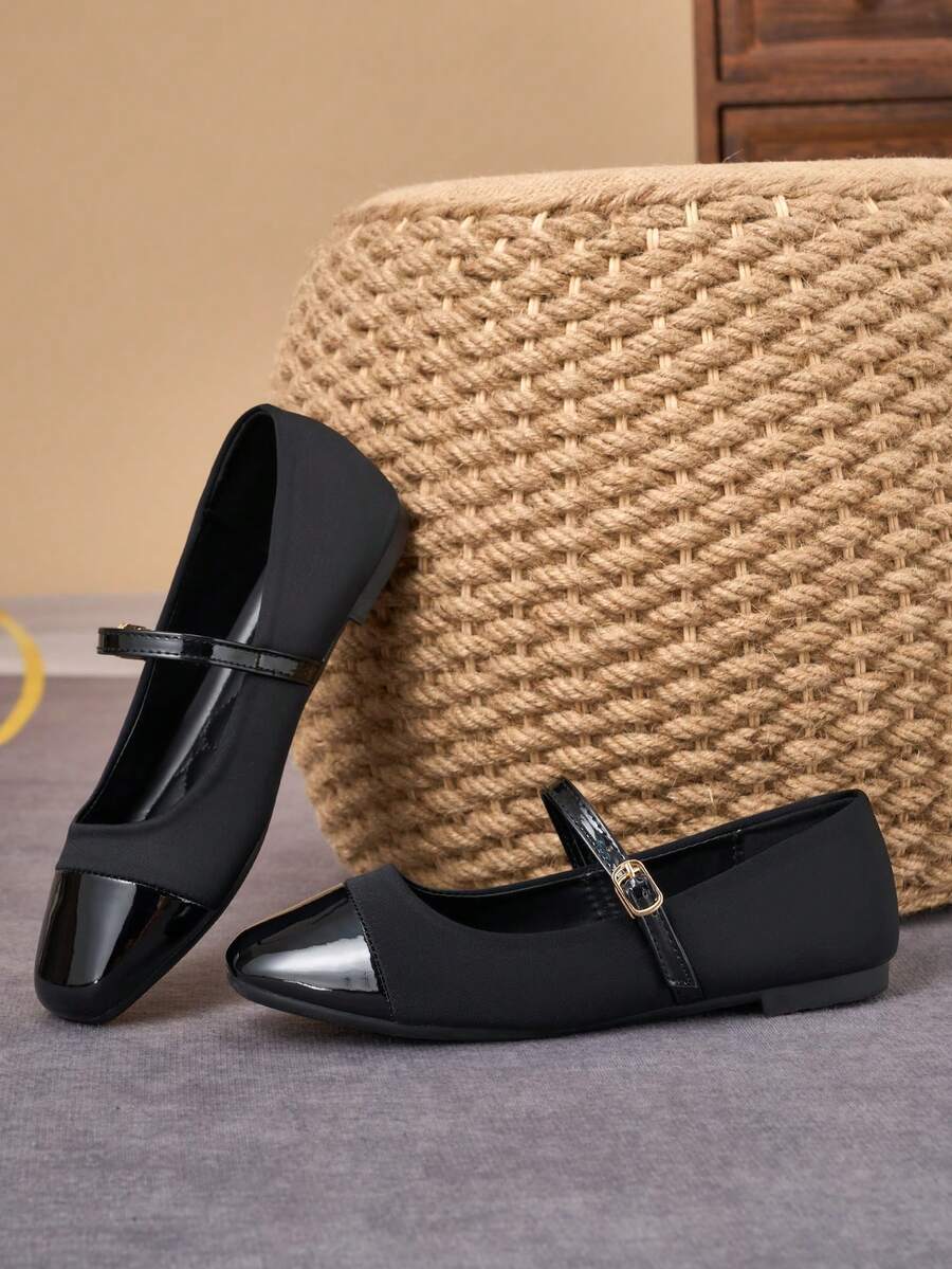 Pair of women's square toe slip-on flat shoes featuring a delicate bow detail and low vamp design.