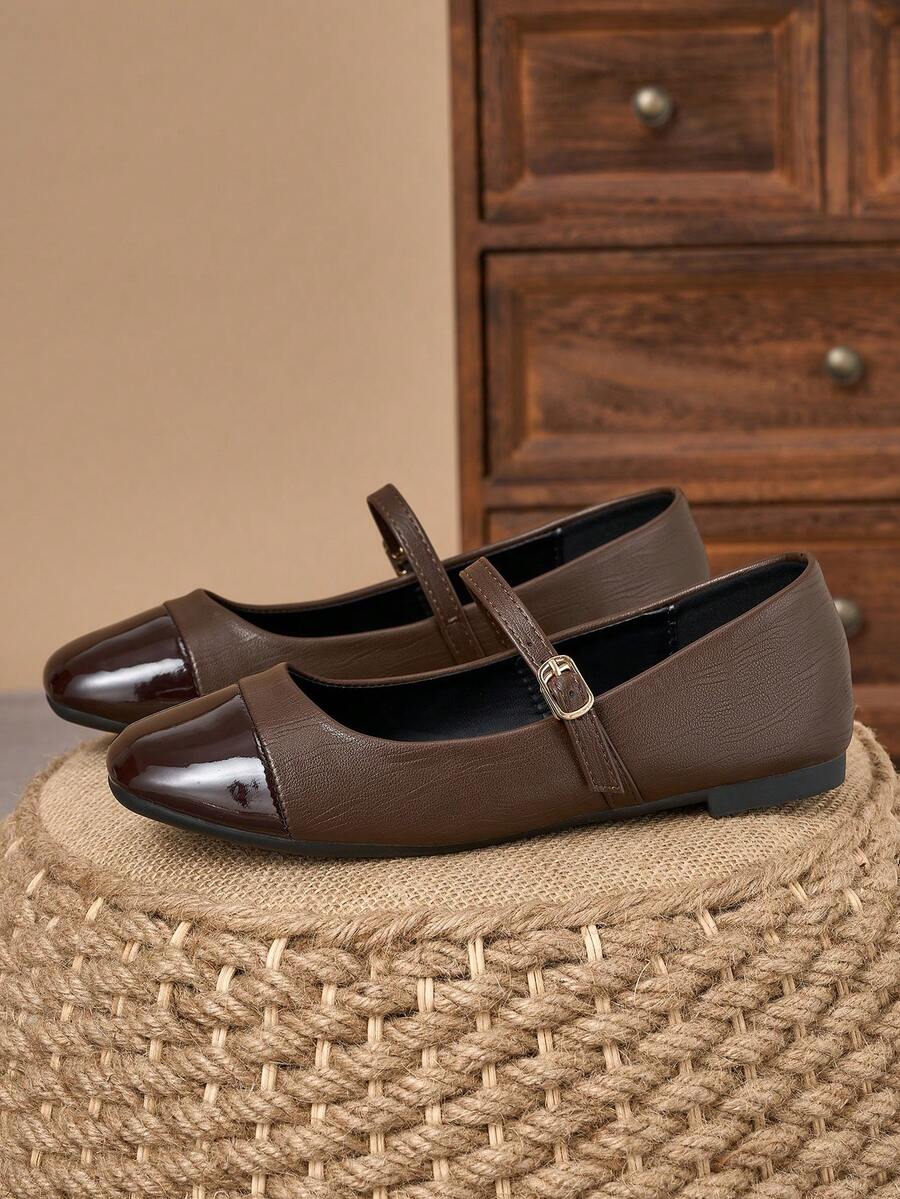 Pair of women's square toe slip-on flat shoes featuring a delicate bow detail and low vamp design.