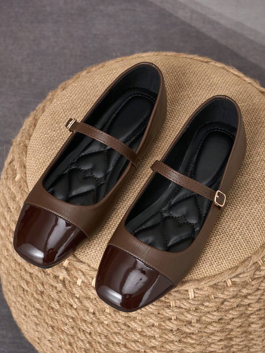 Pair of women's square toe slip-on flat shoes featuring a delicate bow detail and low vamp design.