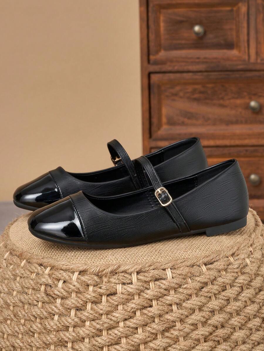 Pair of women's square toe slip-on flat shoes featuring a delicate bow detail and low vamp design.