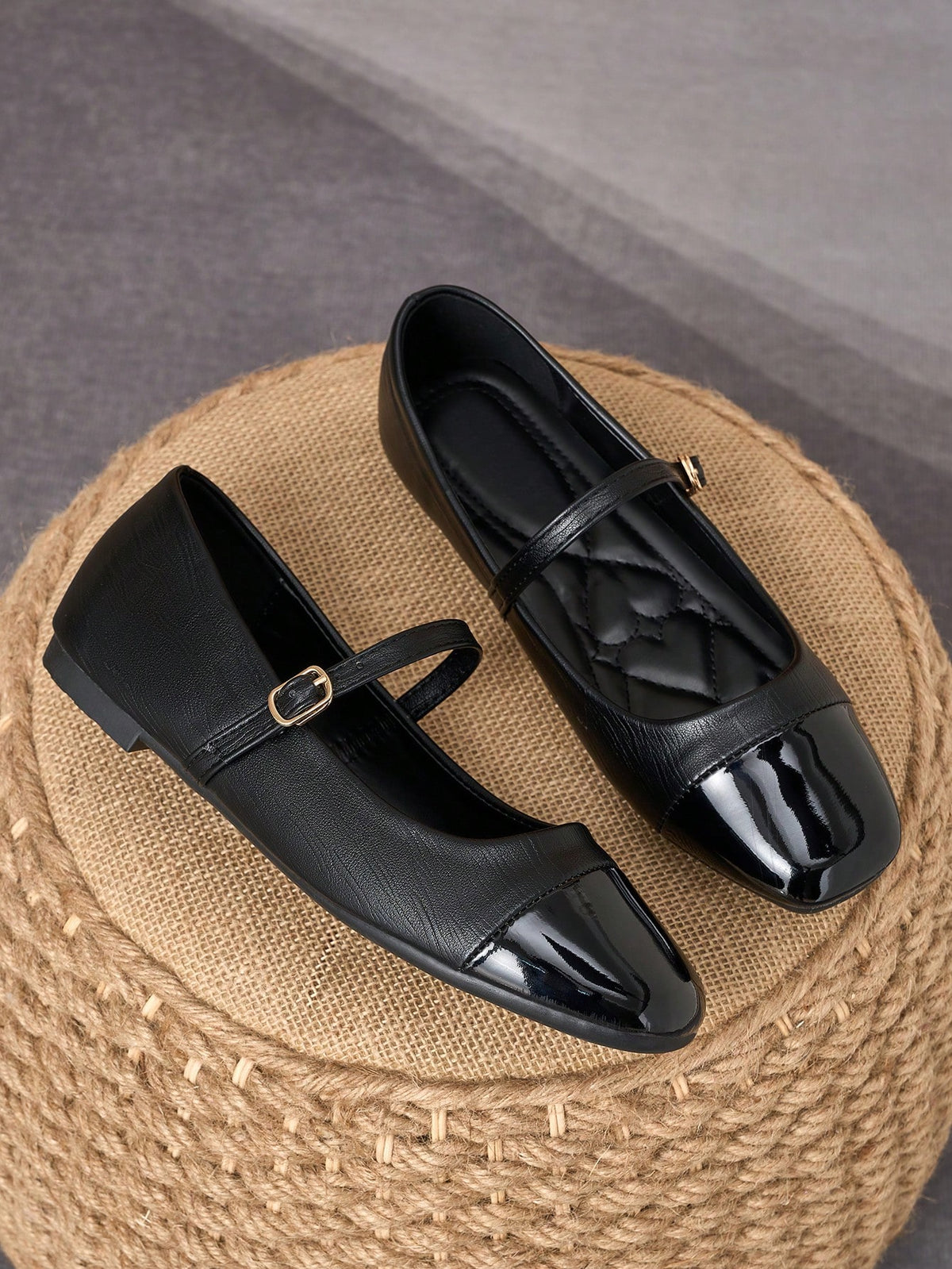 Pair of women's square toe slip-on flat shoes featuring a delicate bow detail and low vamp design.