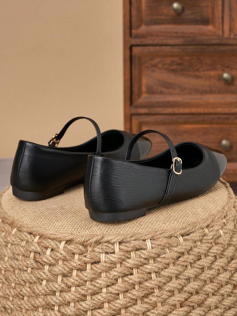 Pair of women's square toe slip-on flat shoes featuring a delicate bow detail and low vamp design.