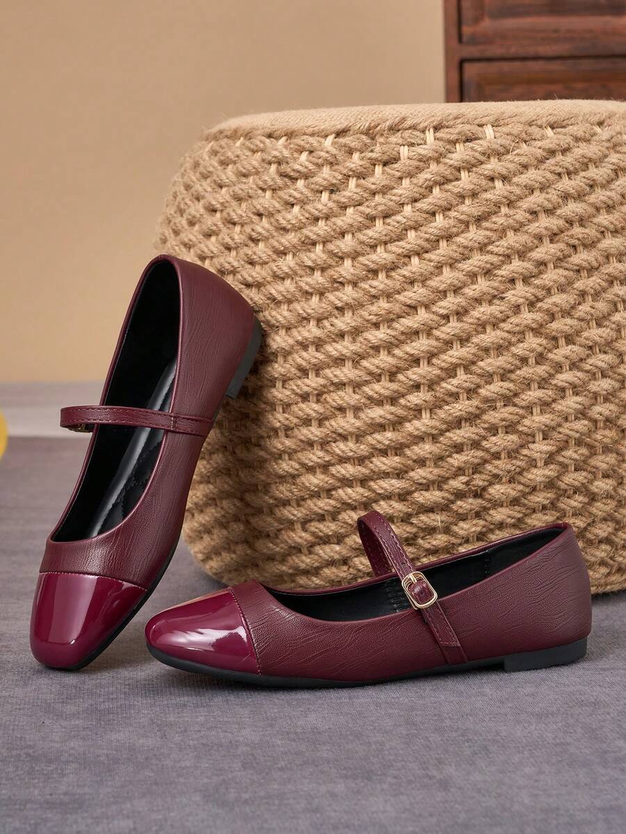 Pair of women's square toe slip-on flat shoes featuring a delicate bow detail and low vamp design.