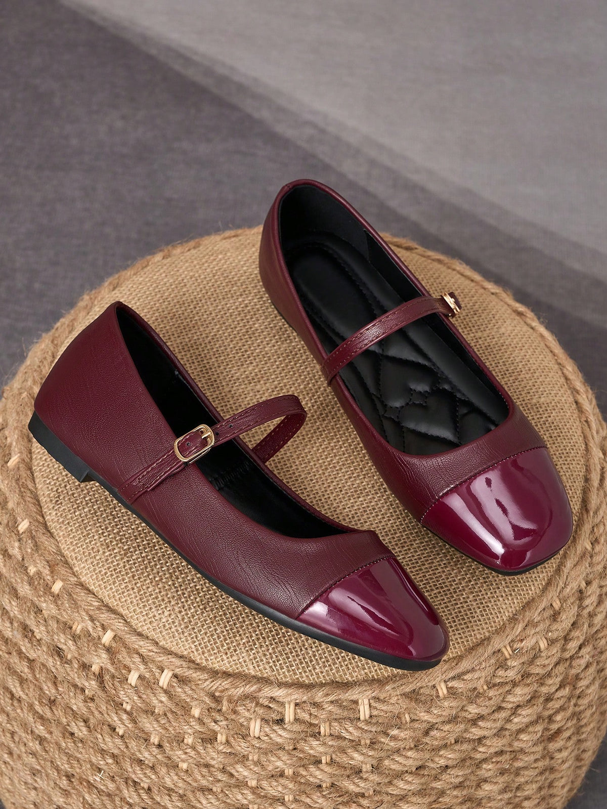 Pair of women's square toe slip-on flat shoes featuring a delicate bow detail and low vamp design.