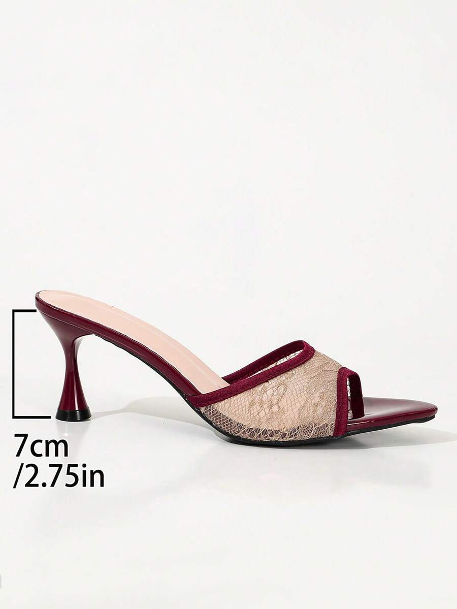 Women's black open toe mesh slide sandals with bowknot detail and stiletto heels