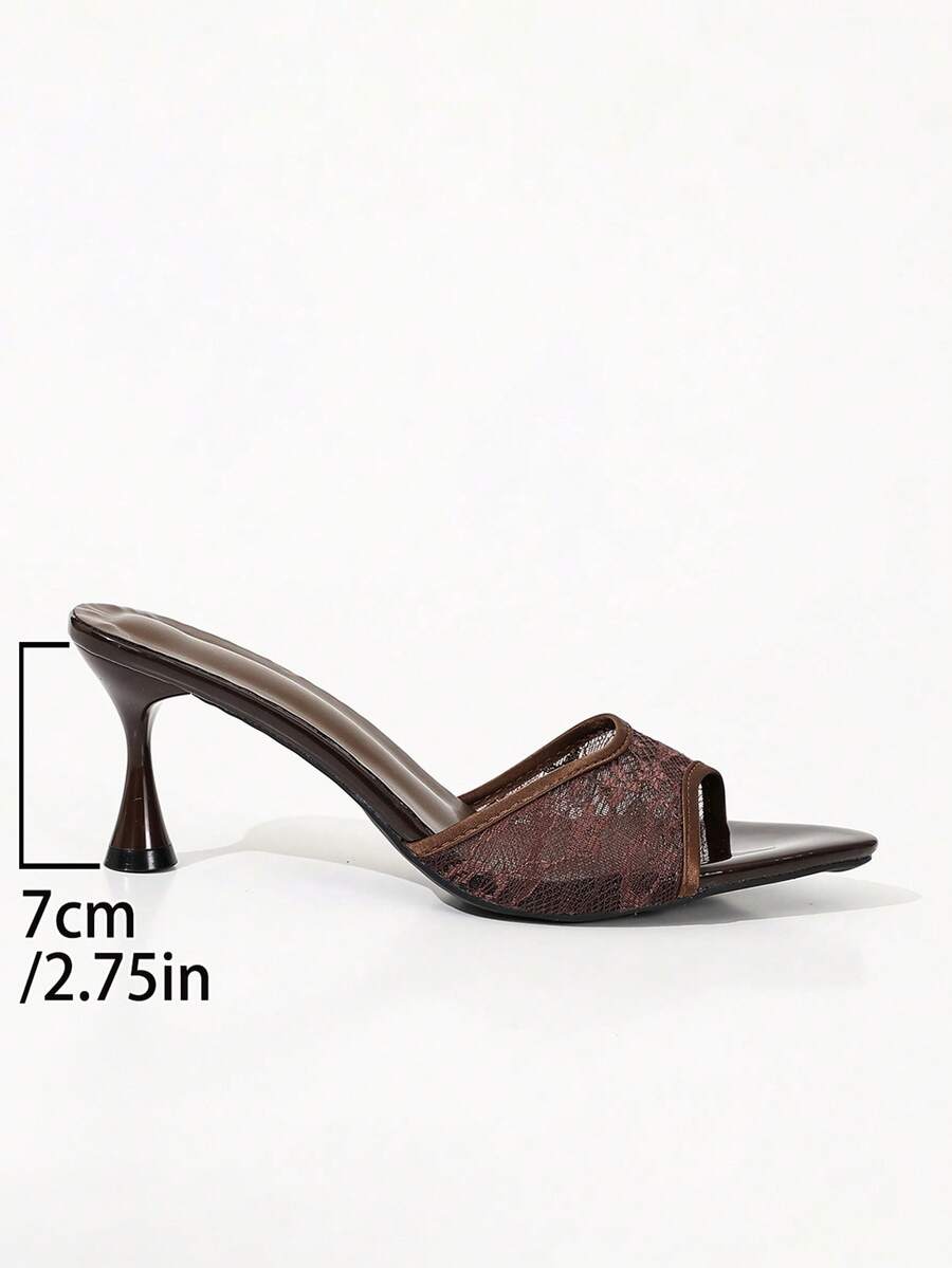 Women's black open toe mesh slide sandals with bowknot detail and stiletto heels