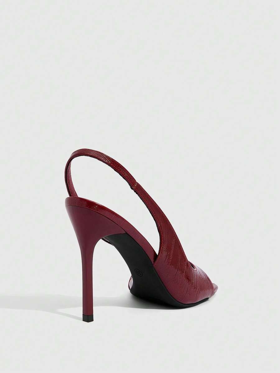 Women's burgundy open toe high heel sandals featuring an embossed finish and slingback strap