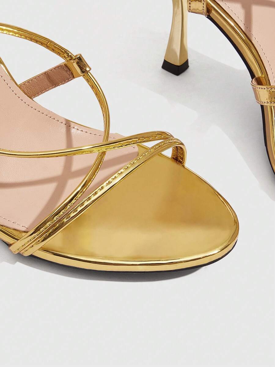 Women's open toe stiletto high heel sandals with criss cross straps and sleek PU leather finish