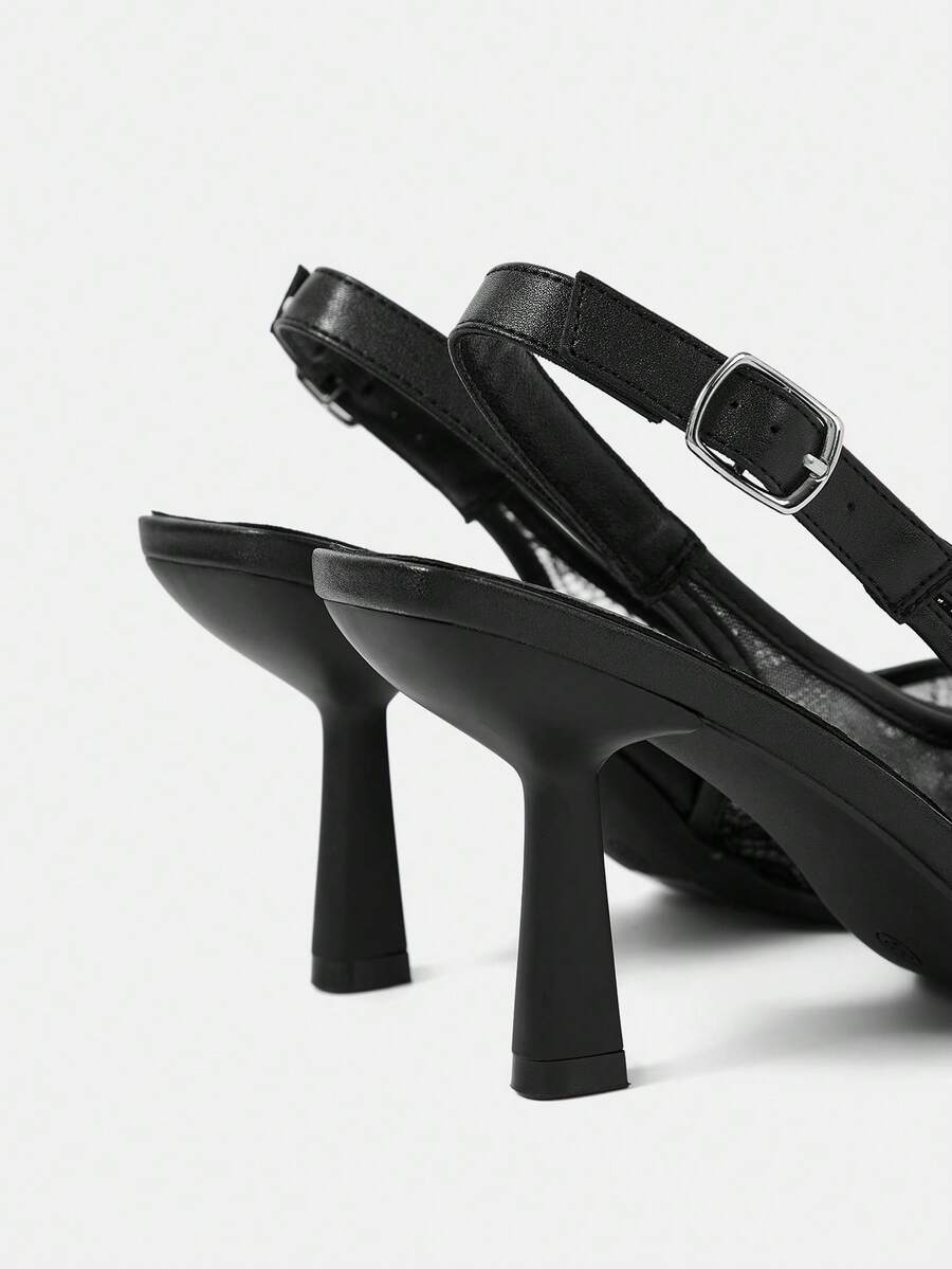Pointed toe stiletto high heel pumps featuring black lace mesh upper, buckle slingback detail, and sleek slip-on design for weddings and evening wear.