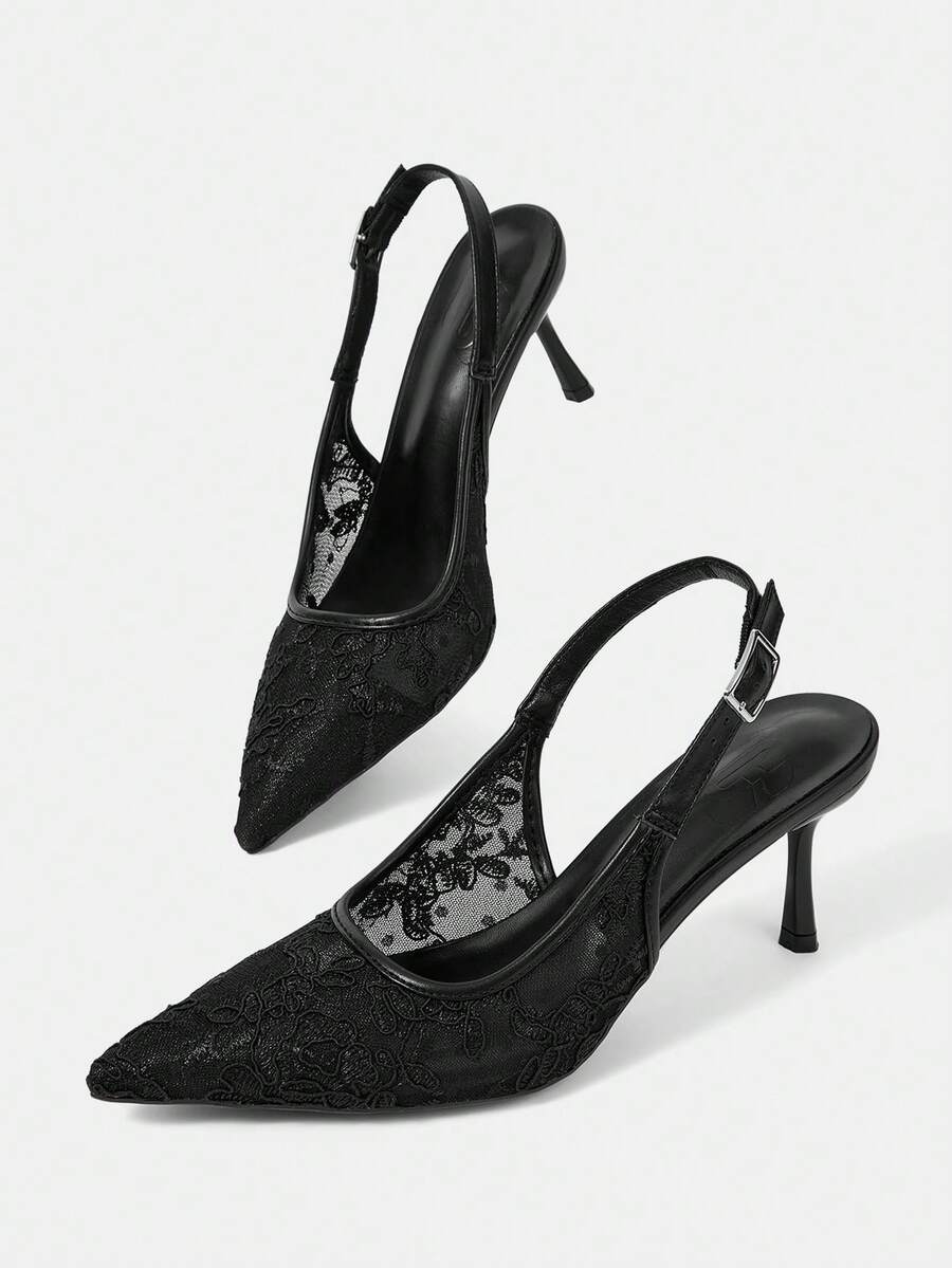 Pointed toe stiletto high heel pumps featuring black lace mesh upper, buckle slingback detail, and sleek slip-on design for weddings and evening wear.