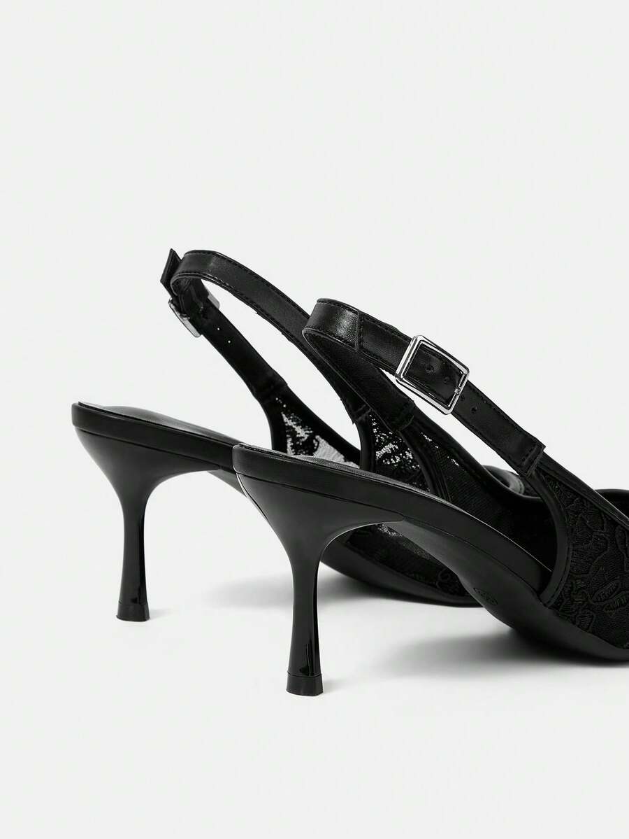 Pointed toe stiletto high heel pumps featuring black lace mesh upper, buckle slingback detail, and sleek slip-on design for weddings and evening wear.