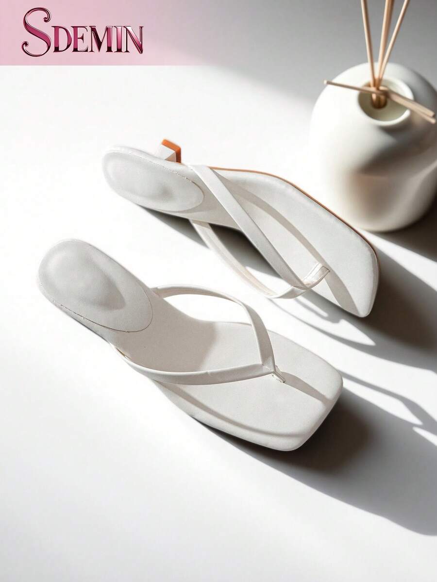 Pair of women's flat slip-on thong sandals and flip-flops featuring a sleek PU leather toe post design and durable rubber sole.