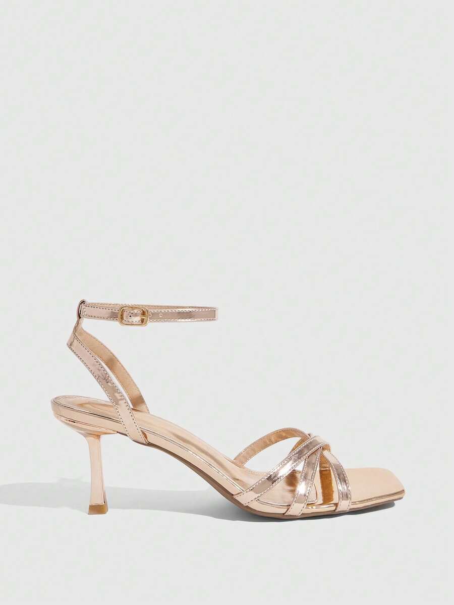 Women's open toe stiletto heel sandals featuring square toe design, criss-cross rhinestone slim straps, and secure ankle strap.