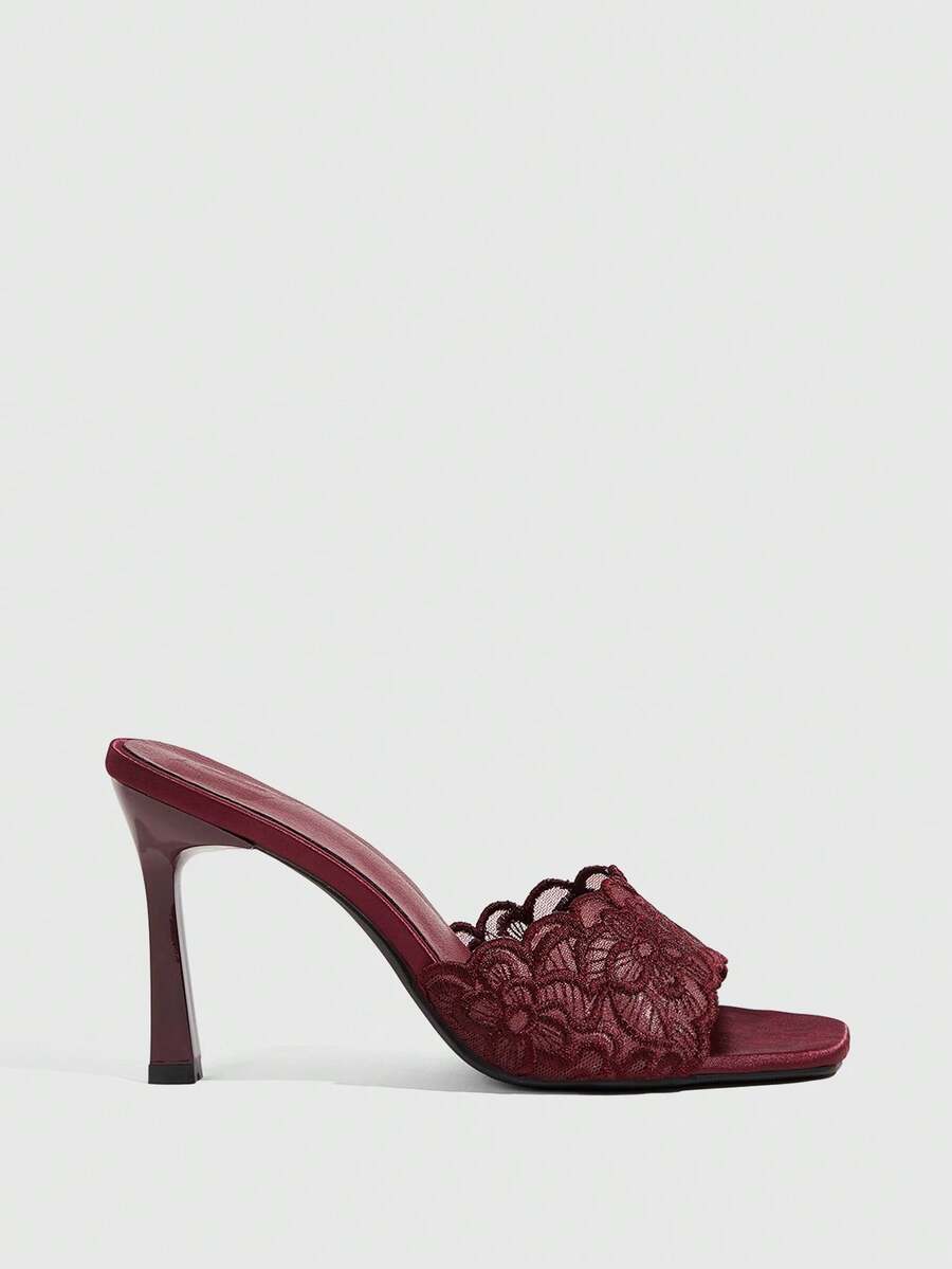 Women's square toe stiletto high heel slide sandals featuring contrast mesh embroidery and an open-toe backless design.