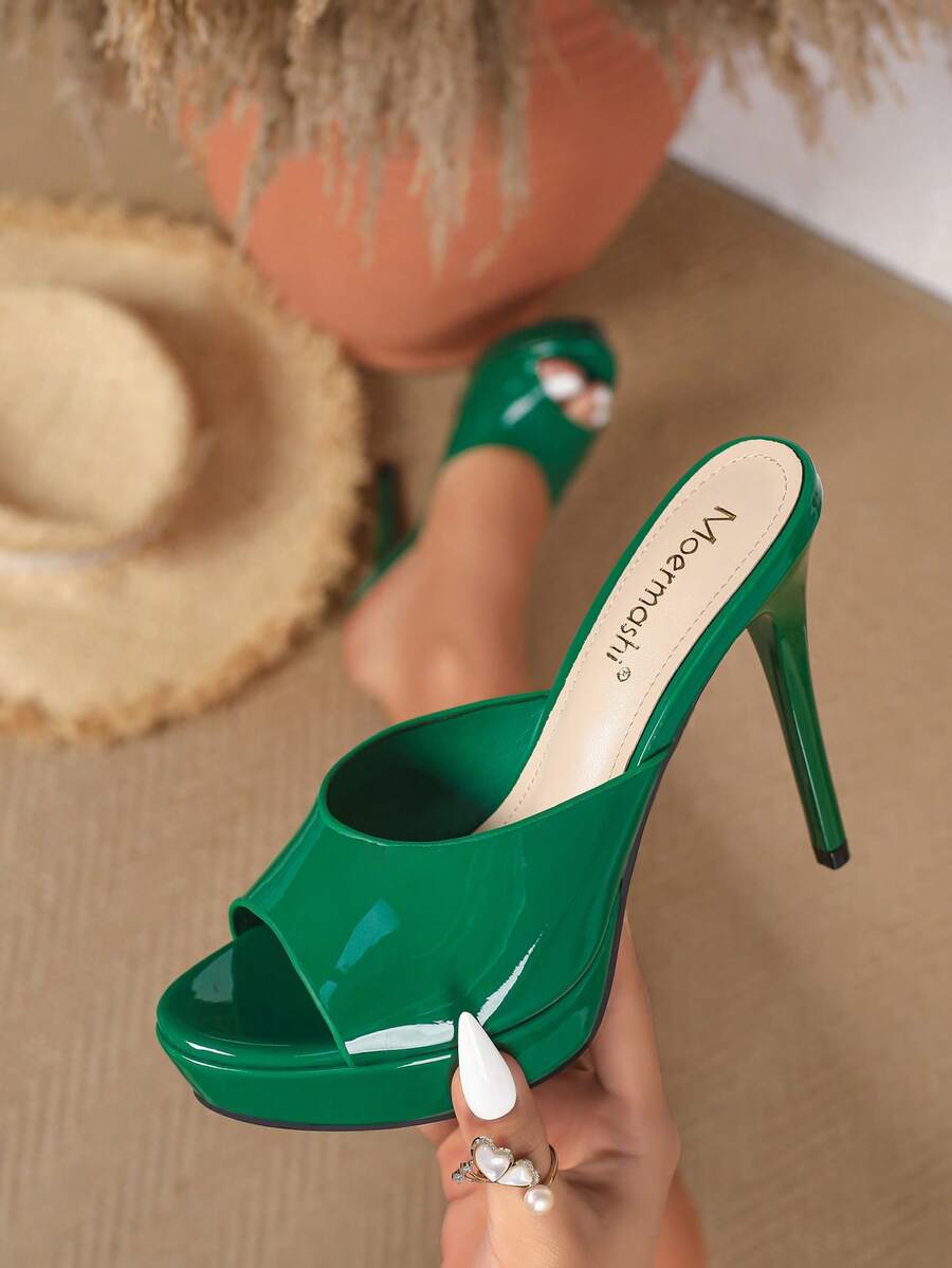 Women's patent leather stiletto heel sandals with open toe ruched slip on mule design.