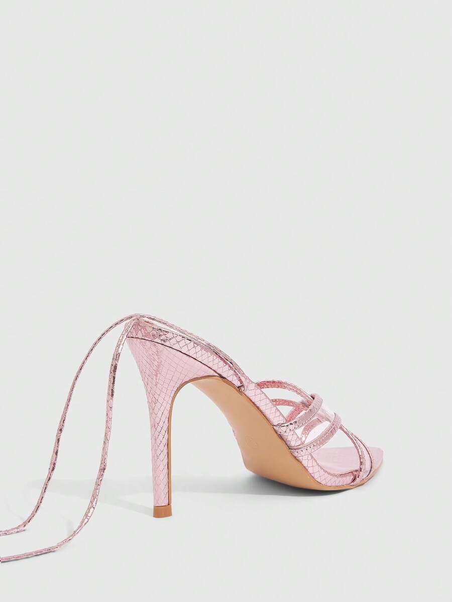 Women's high heel pointed strappy sandals with criss cross lace-up detail and stiletto heel