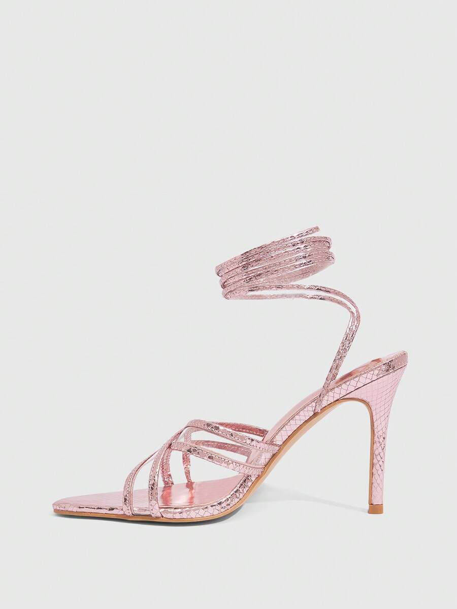 Women's high heel pointed strappy sandals with criss cross lace-up detail and stiletto heel