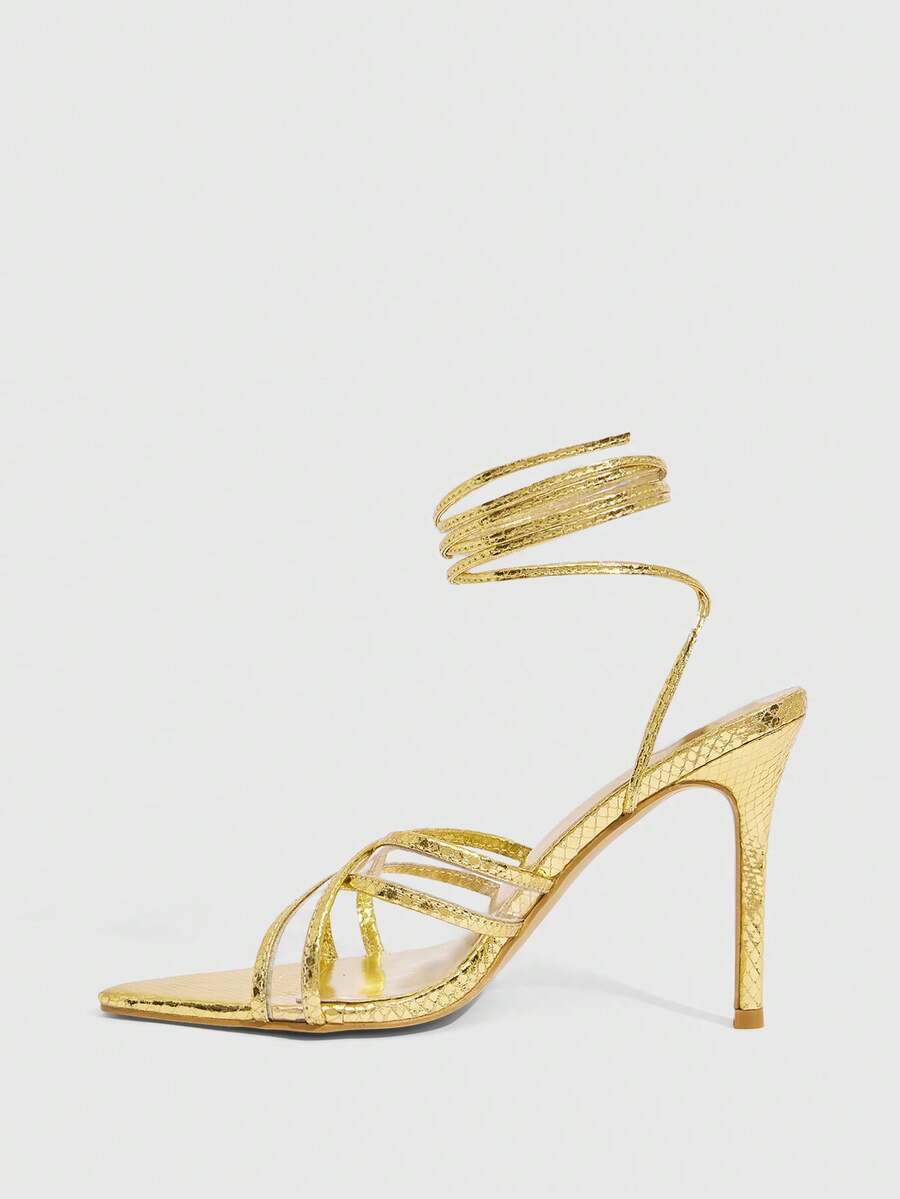 Women's high heel pointed strappy sandals with criss cross lace-up detail and stiletto heel