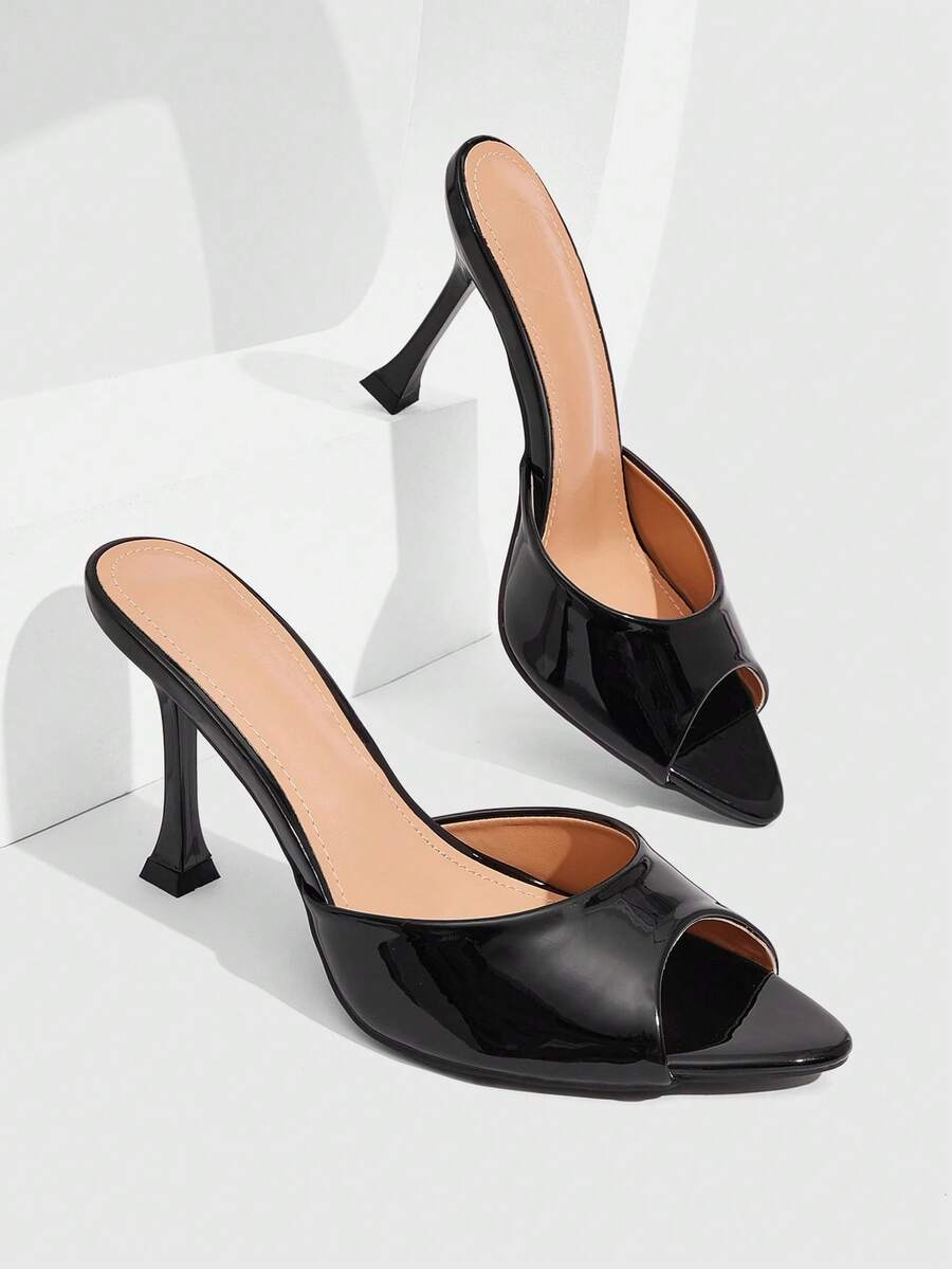 Women's sleek high heel slingback sandals with PU leather finish and stylish pyramid heel.