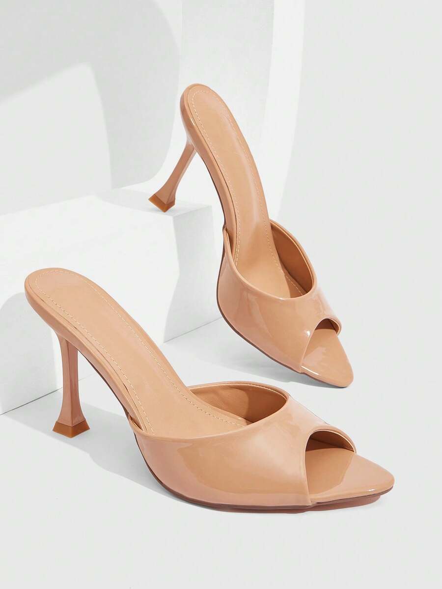 Women's sleek high heel slingback sandals with PU leather finish and stylish pyramid heel.