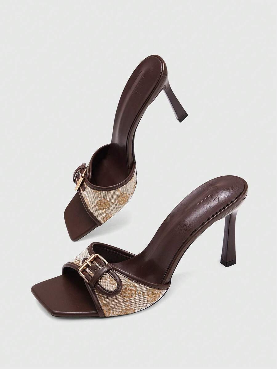 Women's brown open-toe slingback heeled sandals with stiletto heel and buckle strap.