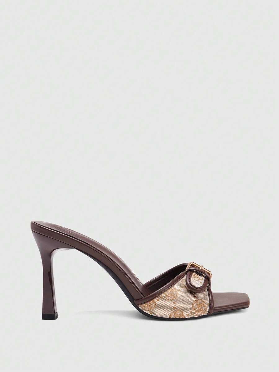 Women's brown open-toe slingback heeled sandals with stiletto heel and buckle strap.