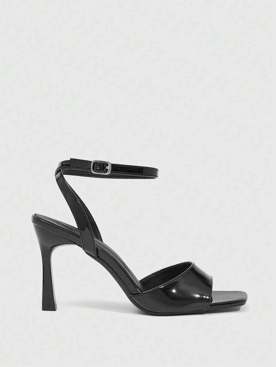 Women's peep toe ankle strap high heel sandals featuring a sleek stiletto heel and adjustable buckle closure.