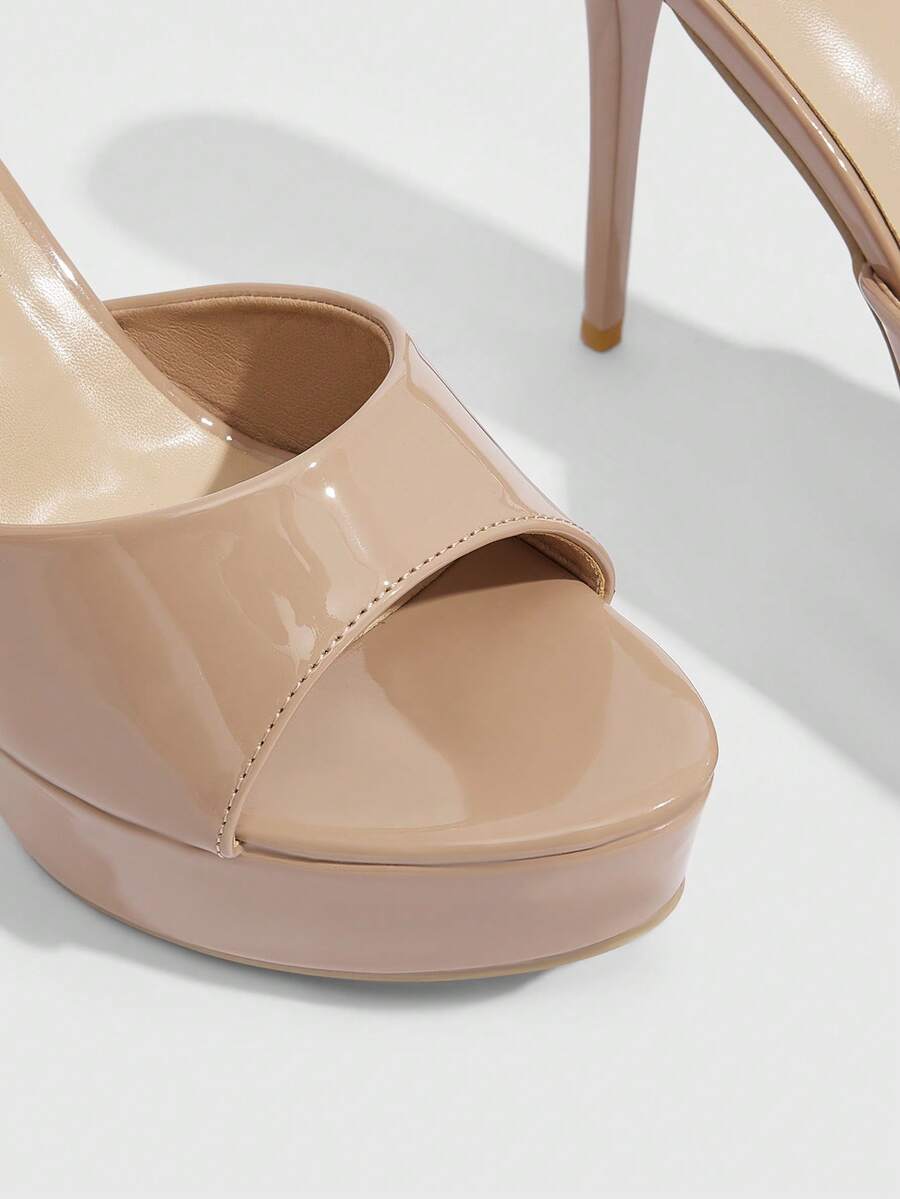 Women's open-toe round toe stiletto high heel sandals featuring a sleek slingback strap and elegant mid-heel design.