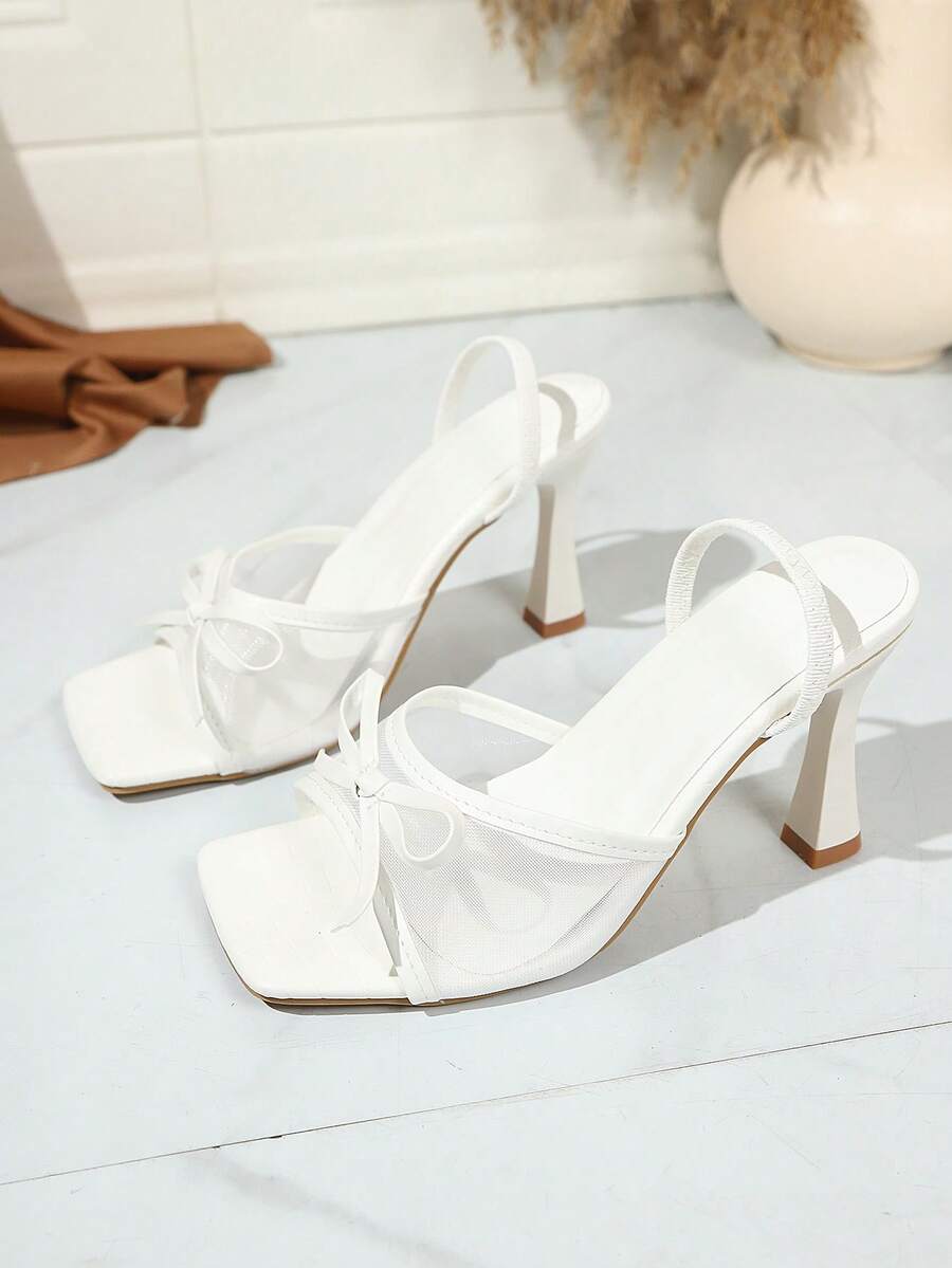 Square toe thin heel thong sandals for women featuring an open toe, bowknot detail, and slip-on slingback design.