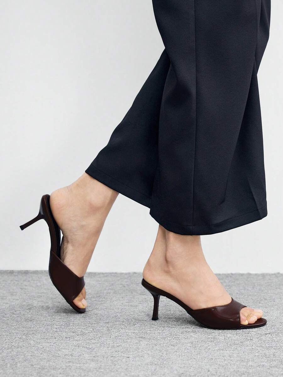 Women's slip on kitten heel mules and open toe heeled sandals in apricot