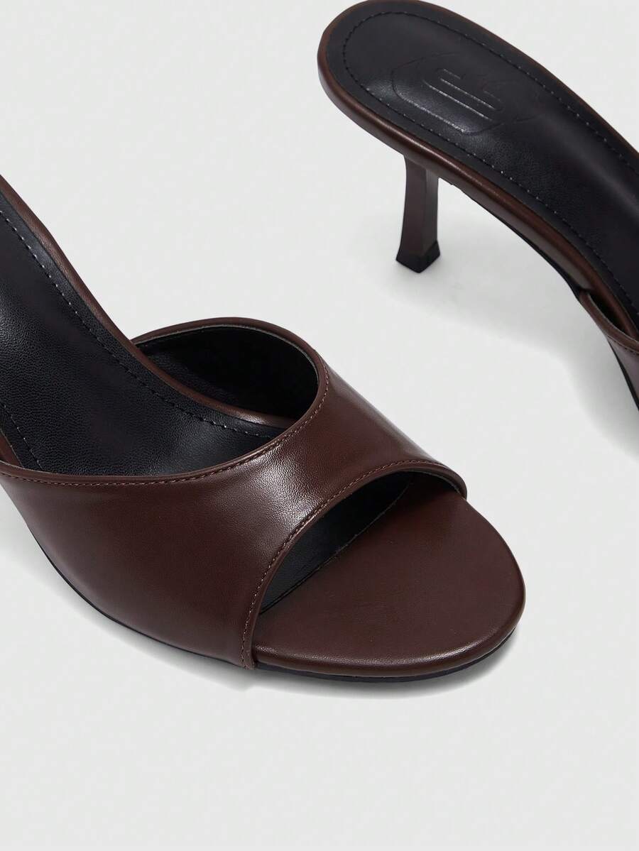 Women's slip on kitten heel mules and open toe heeled sandals in apricot
