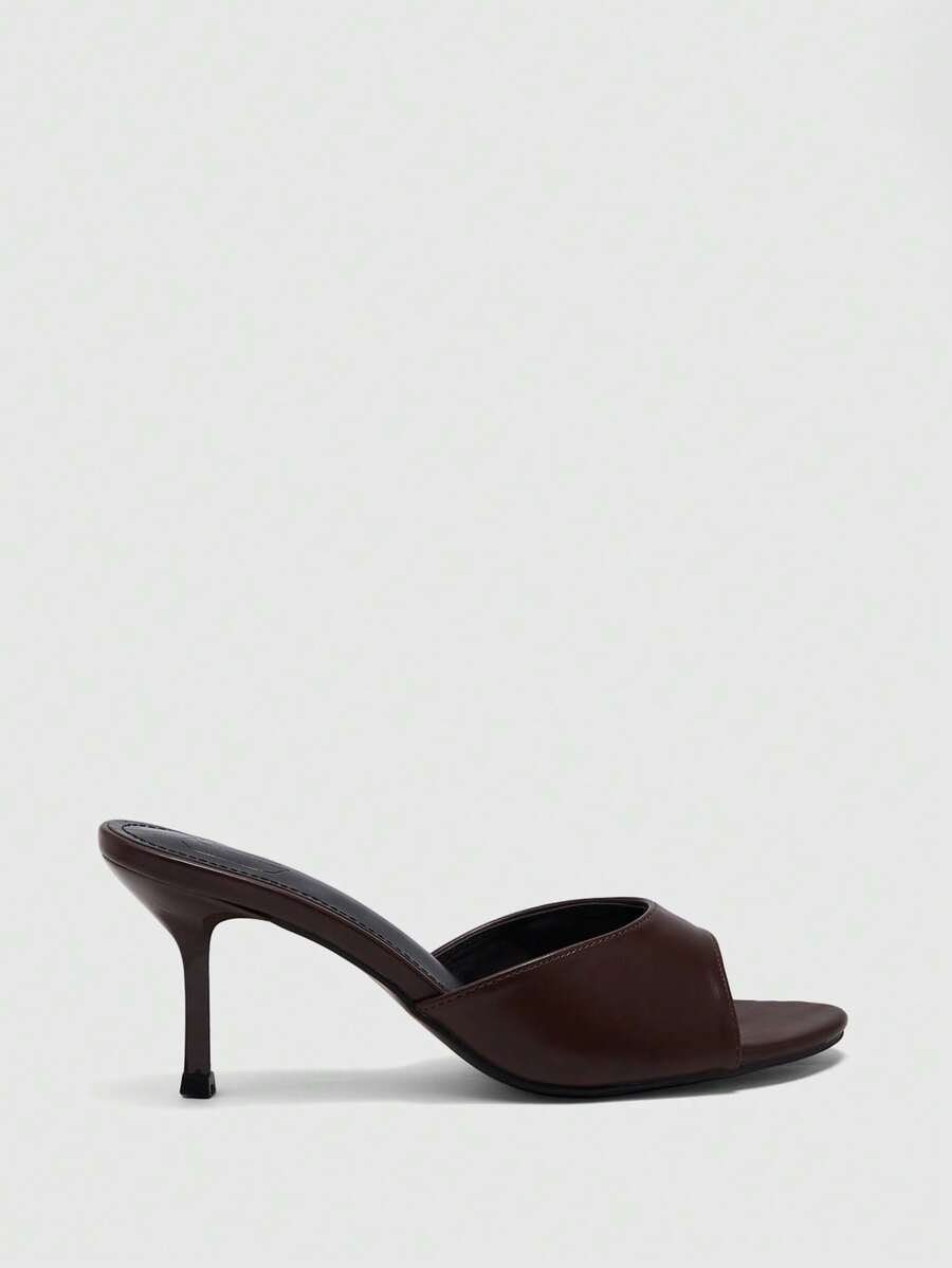 Women's slip on kitten heel mules and open toe heeled sandals in apricot