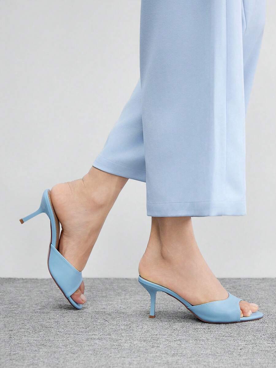 Pair of women's open toe high heel slingback sandals made with smooth PU leather