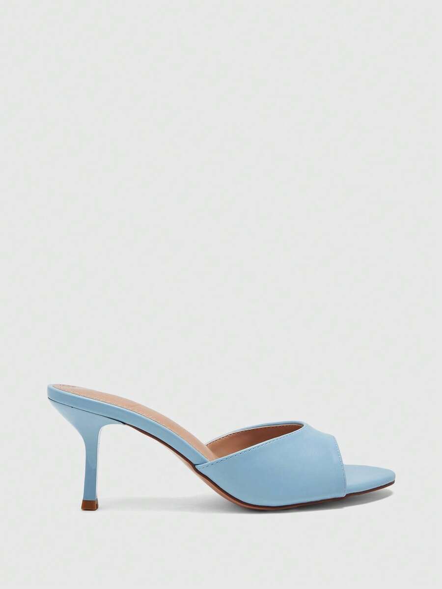 Pair of women's open toe high heel slingback sandals made with smooth PU leather