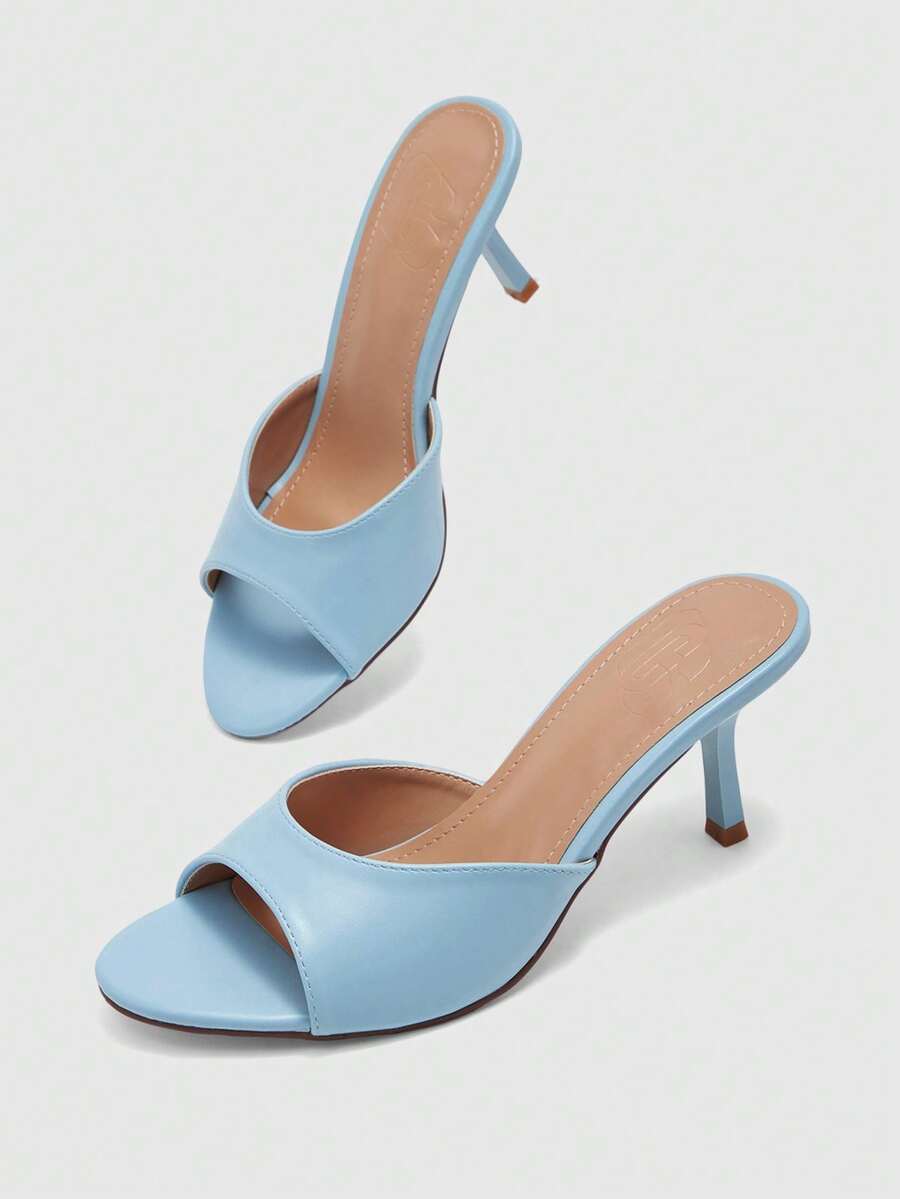 Pair of women's open toe high heel slingback sandals made with smooth PU leather