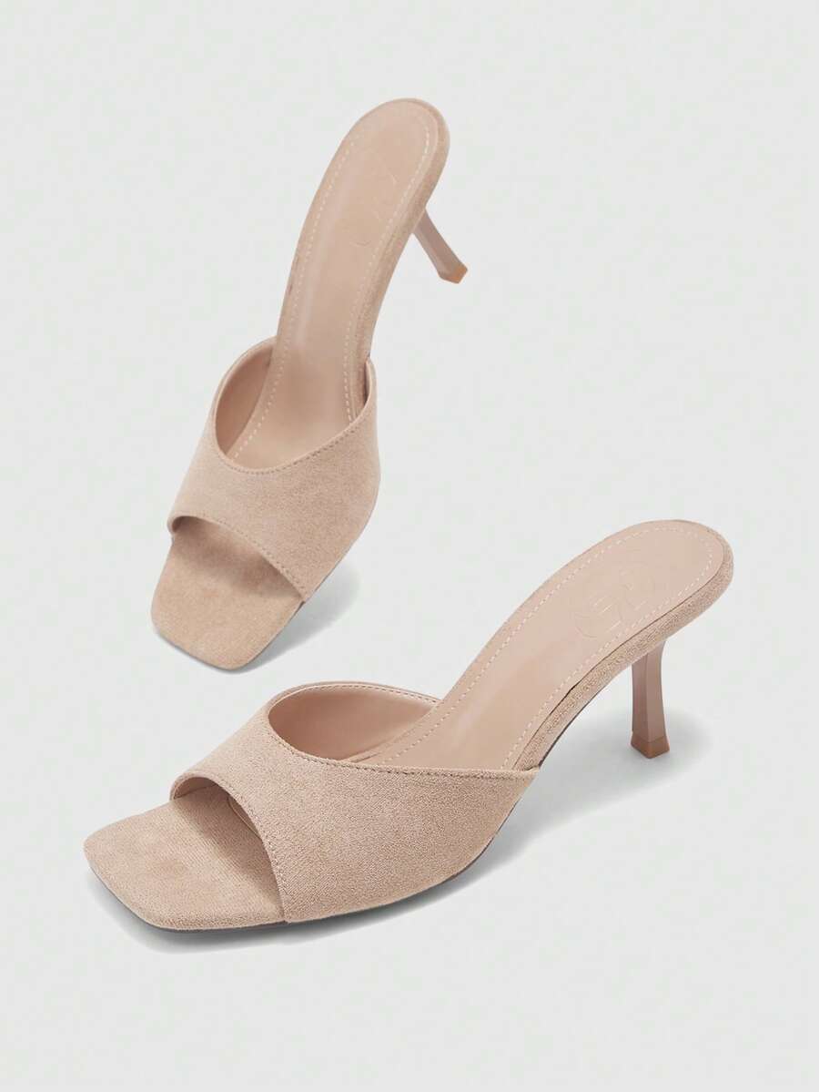 Women's black square toe high heel sandals featuring an open toe design, thin stiletto heel, and slingback strap.