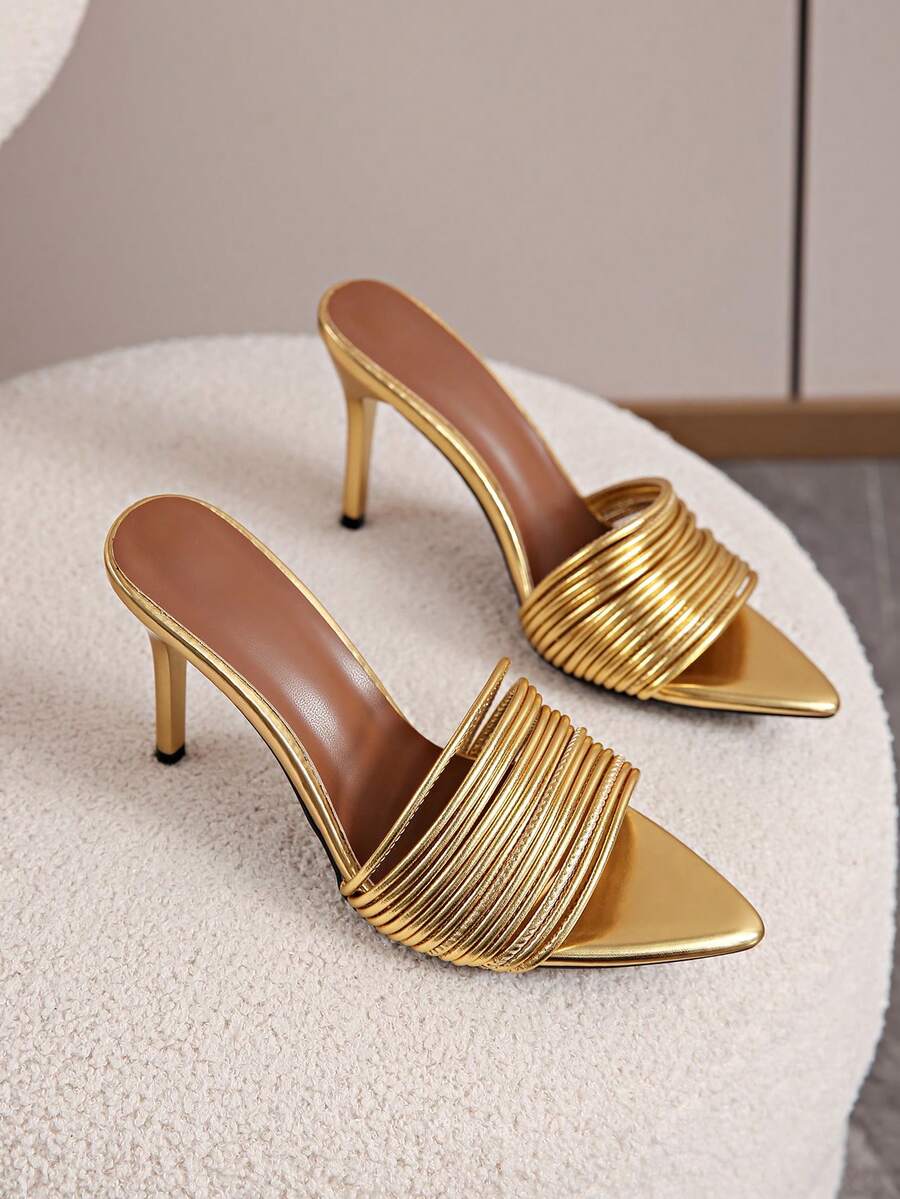Women's pointed toe high heel mules with stiletto heels and slip-on strap design