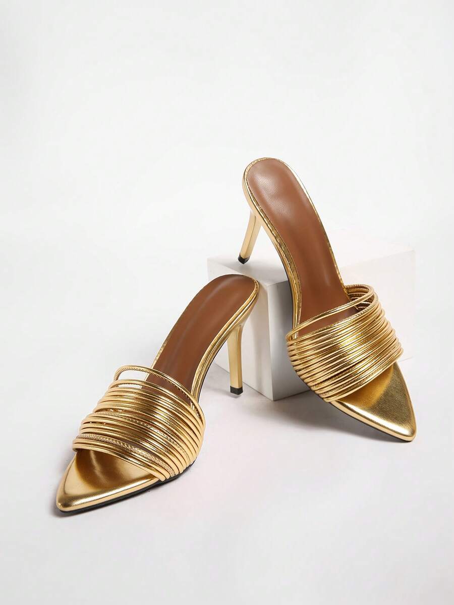 Women's pointed toe high heel mules with stiletto heels and slip-on strap design