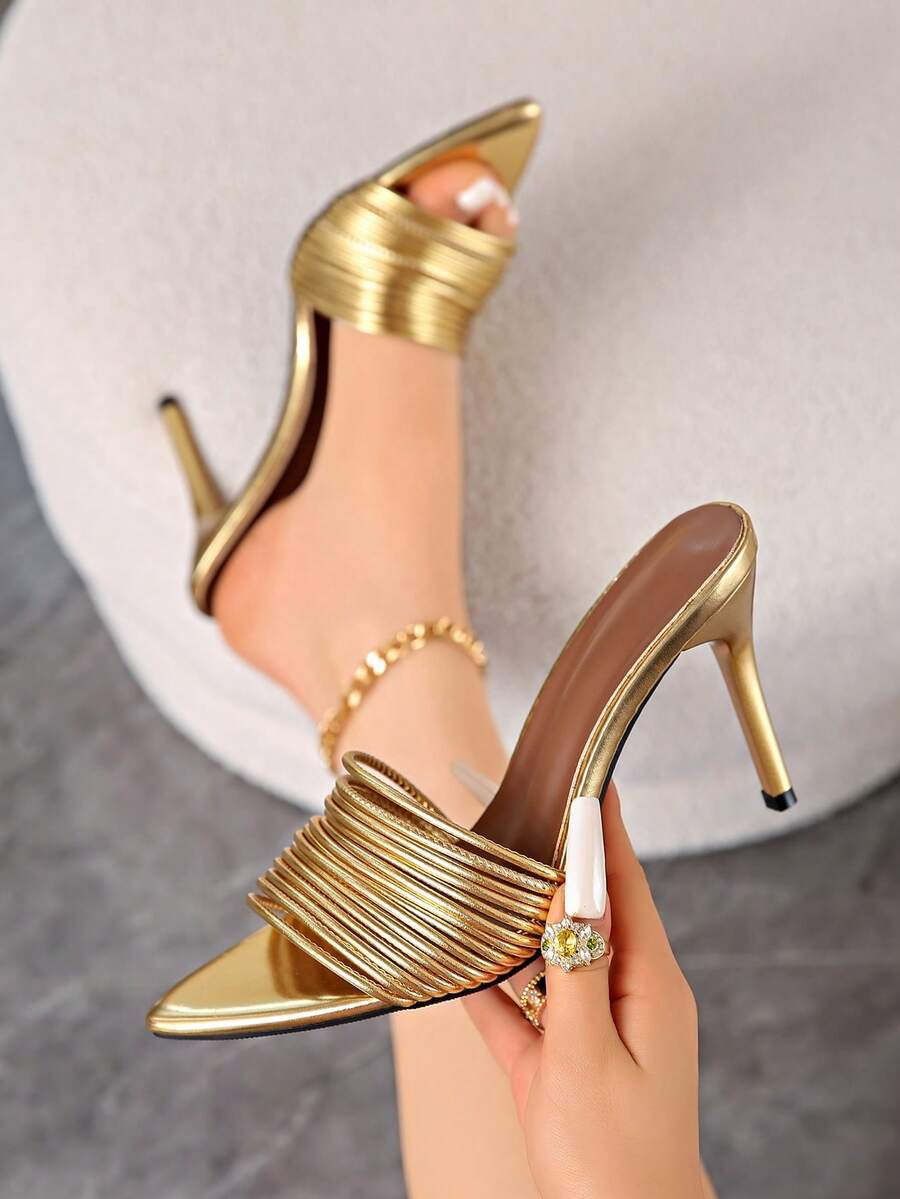 Women's pointed toe high heel mules with stiletto heels and slip-on strap design