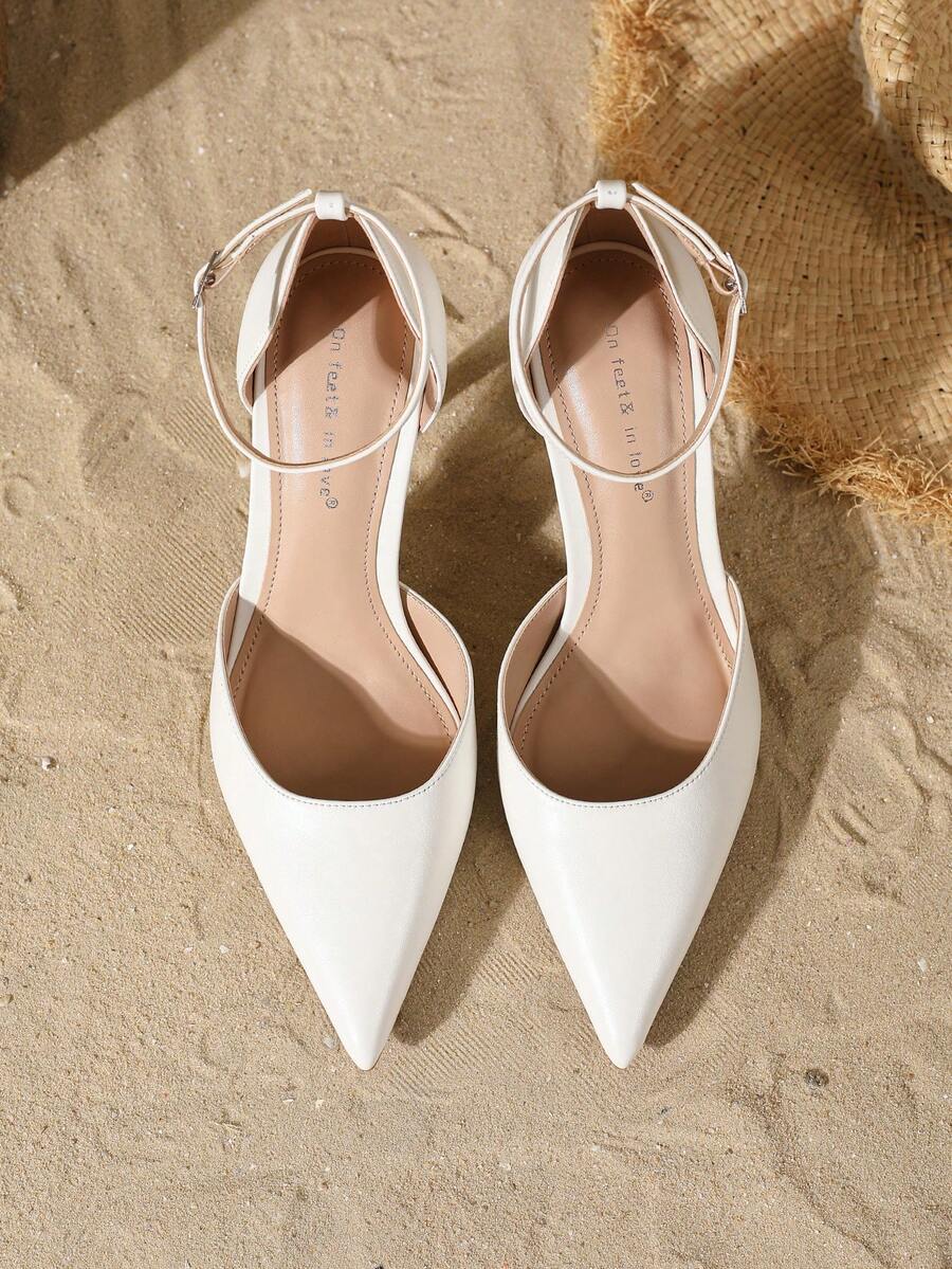 Elegant pointy-toe stiletto high heel pumps with hollow out sides and buckle ankle strap for weddings and evening dresses.