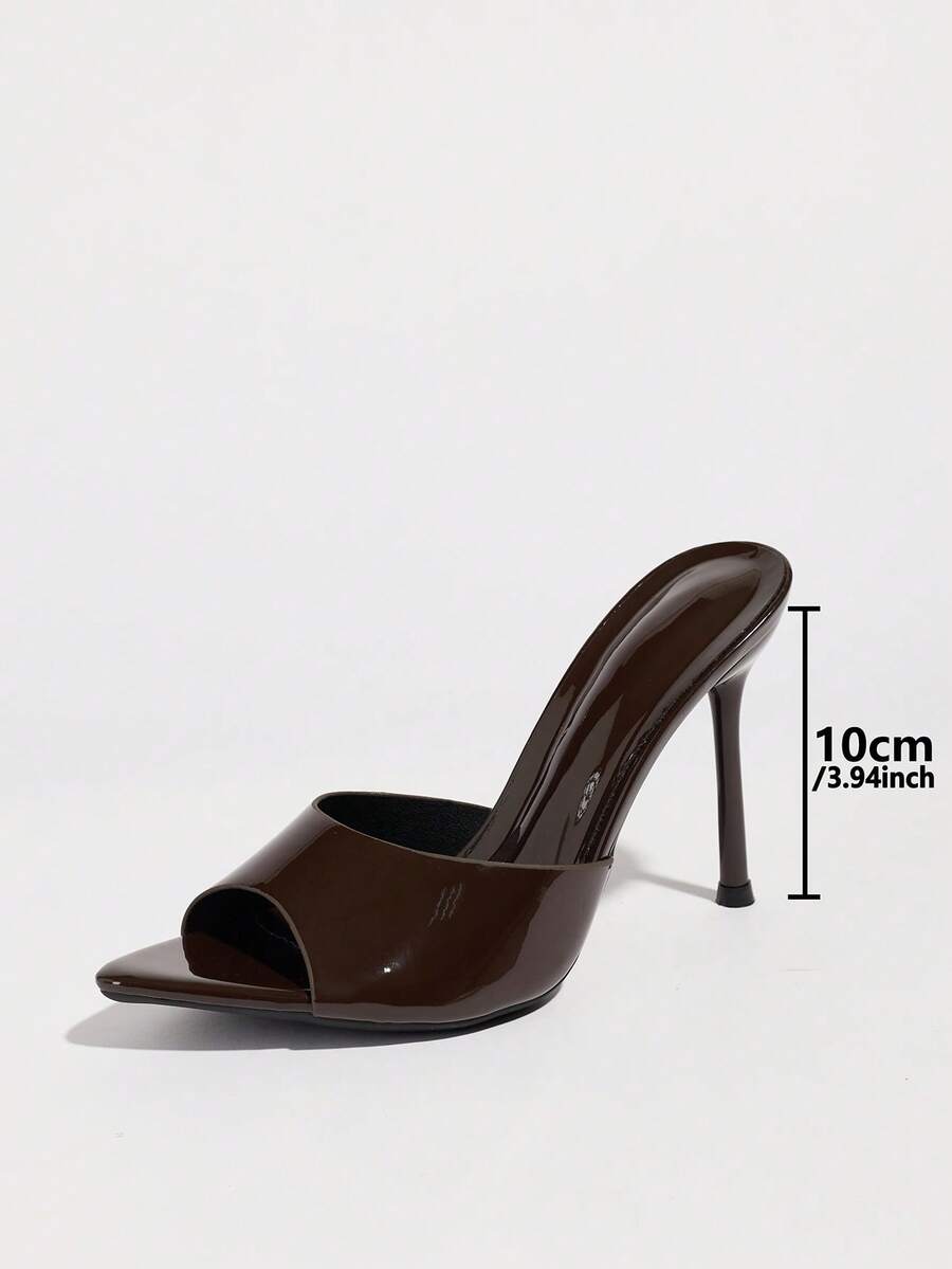 Women's coffee brown high heel mule shoes featuring a glossy mirror finish, open toe design, and sleek stiletto heel.