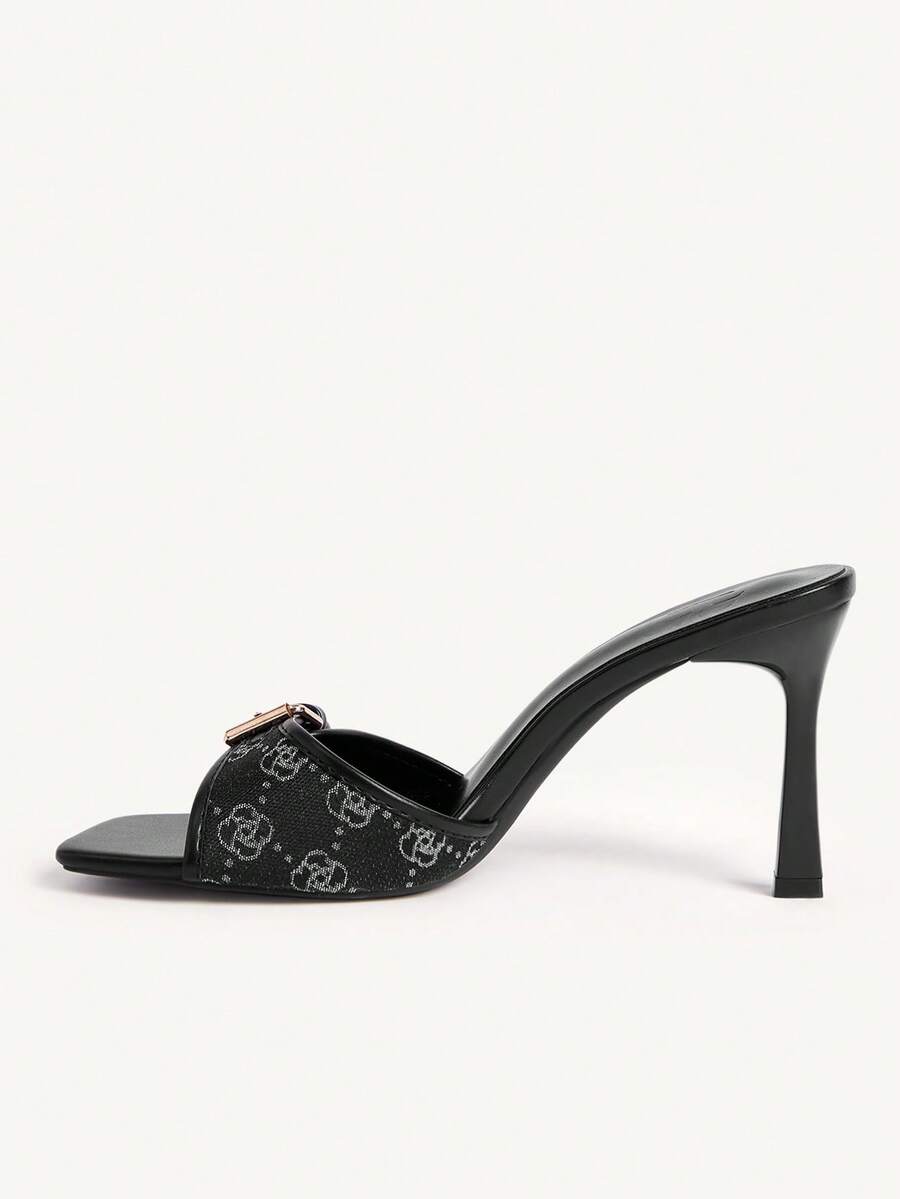 Women's brown open-toe slingback heeled sandals with stiletto heel and buckle strap.