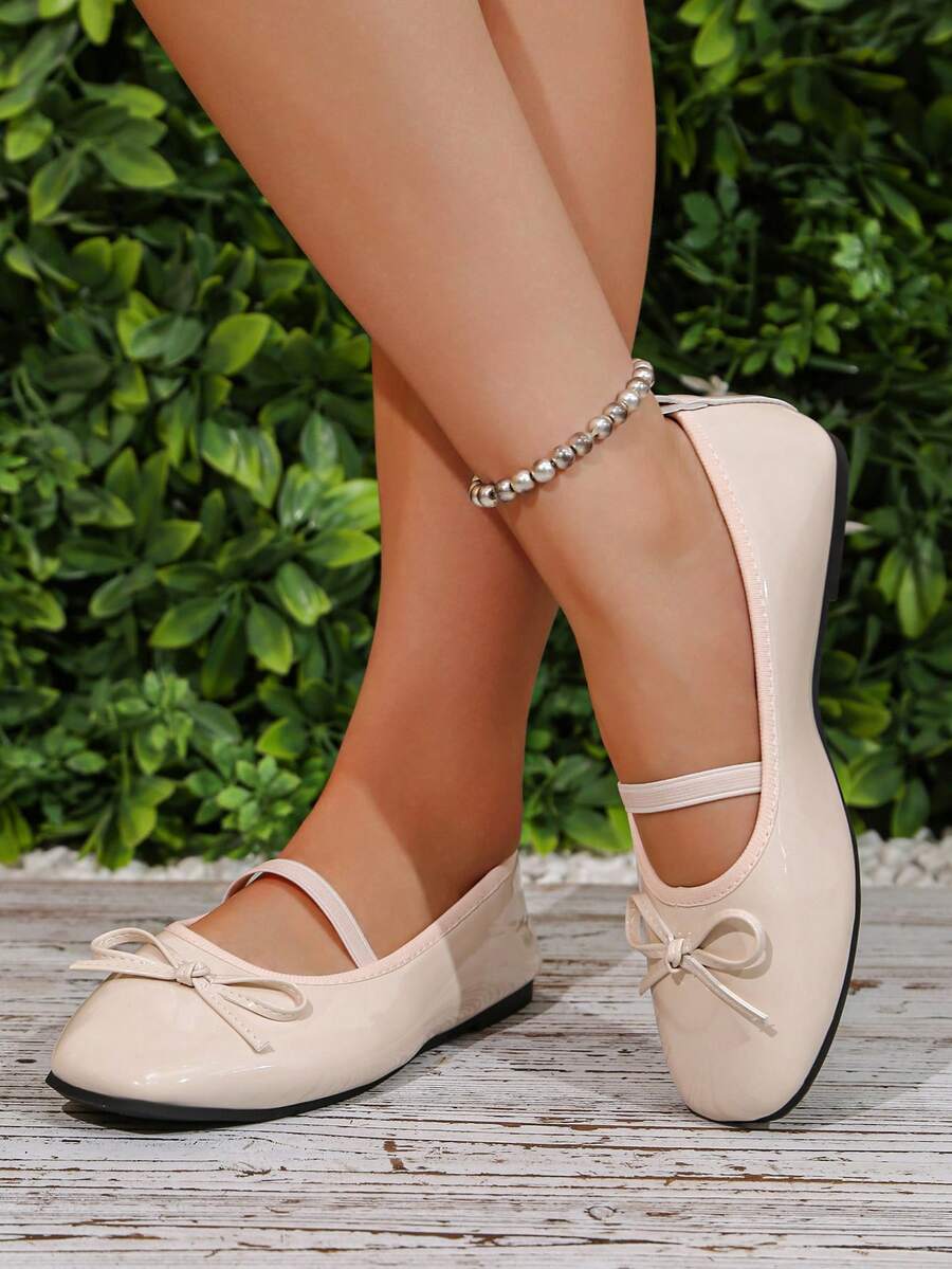Square toe ballet flat shoes with bow detail and slip-on wide fit design.