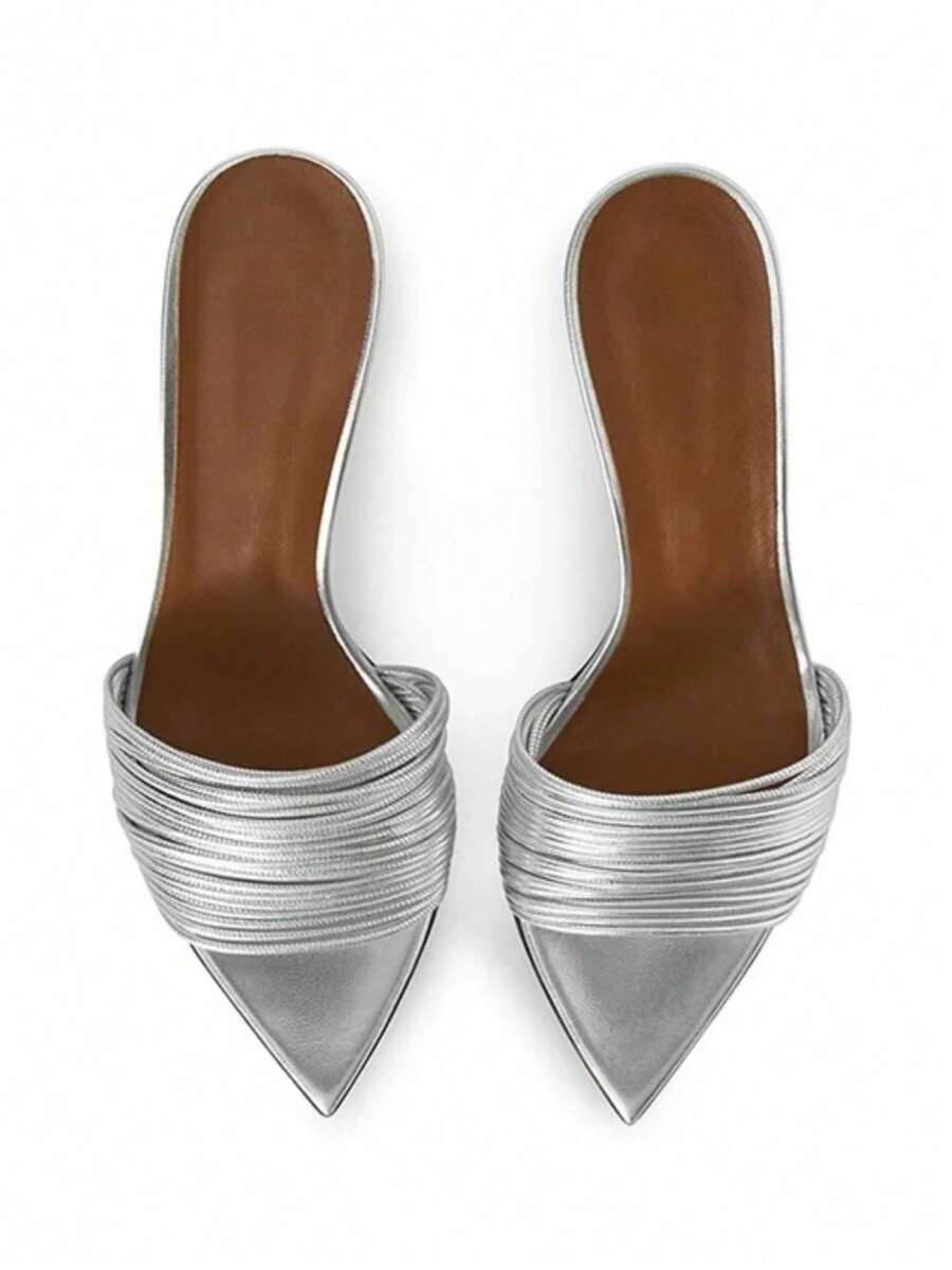 Women's pointed toe high heel mules with stiletto heels and slip-on strap design