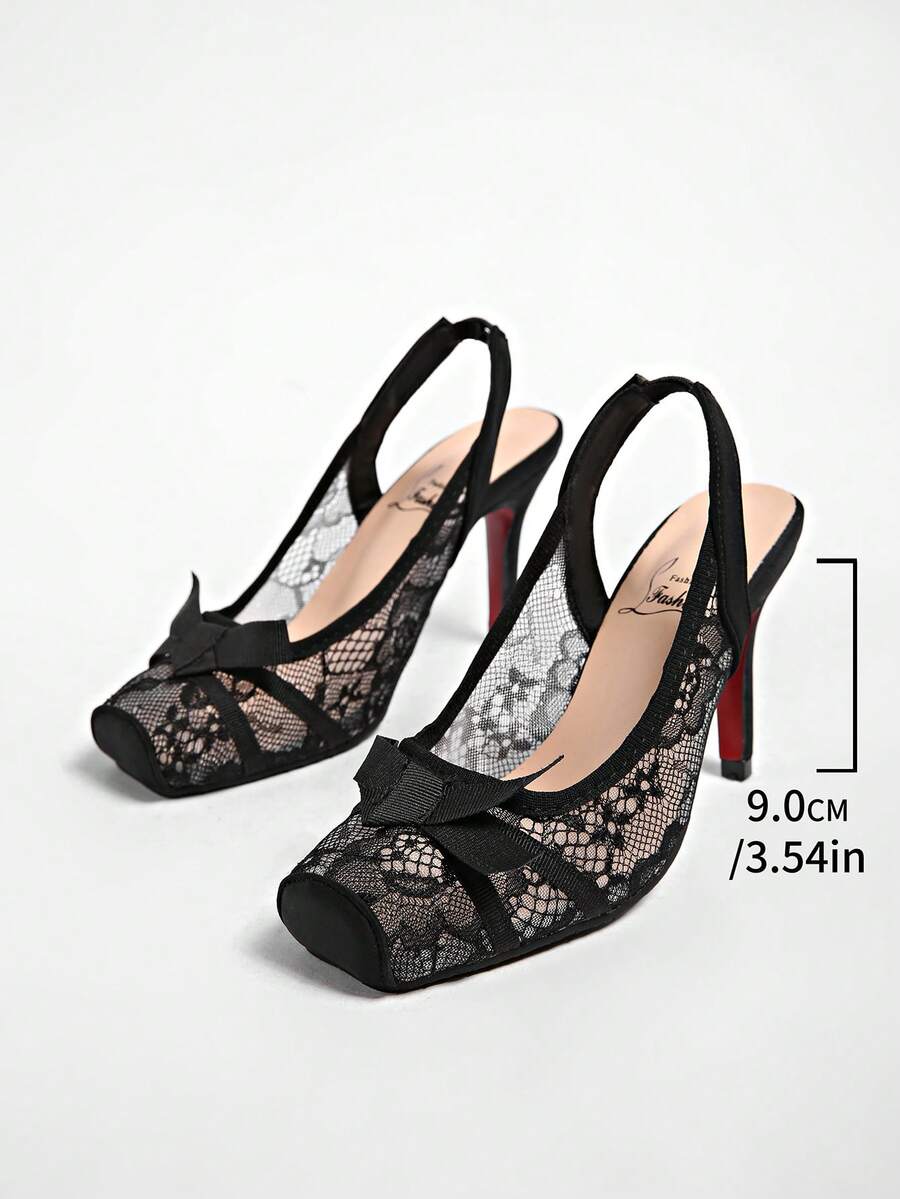 Black lace high heel sandals for women with a big bowknot, closed square toe, and stiletto heel.